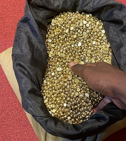 Gold bullion in a secure vault for international gold supply